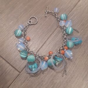 Silver coloured glass turquoise beaded bracelet